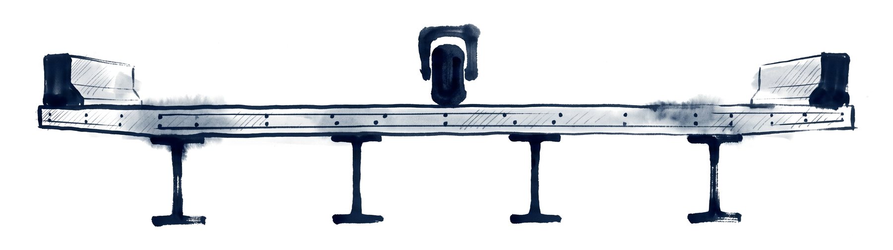 Cross-section of a concrete deck on four girders with barriers at the overhangs and a wheel load between two girders